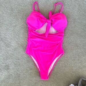 Pink convertible swimsuit. can become strapless